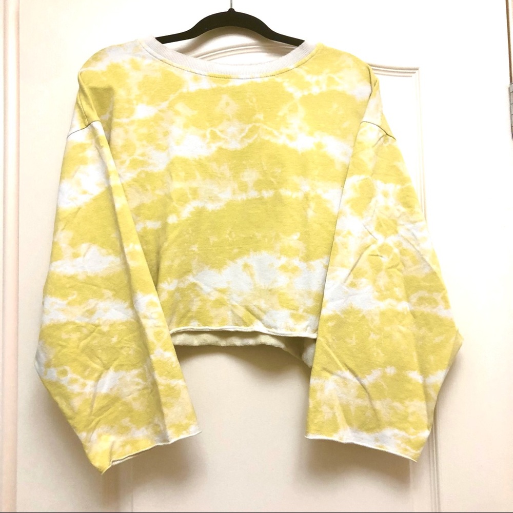 Yellow Tie Dye Crop Sweatshirt With Raw Hem And Distressed Crew Neck Collar.